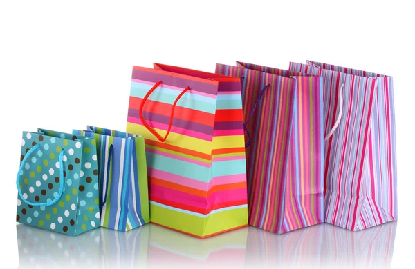 Bolsas de regalo brillantes aisladas en blanco —  Fotos de Stock