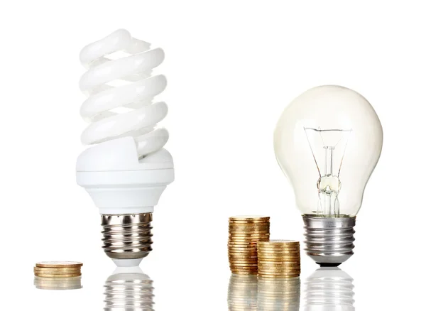 Comparison of ordinary light bulbs with energy saving lamp isolated on whit — Stock Photo, Image