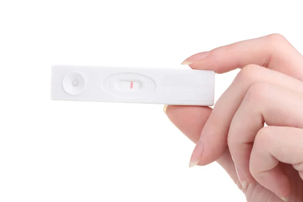 Τεστ εγκυμοσύνης στο χέρι που απομονώνονται σε λευκό — Φωτογραφία Αρχείου