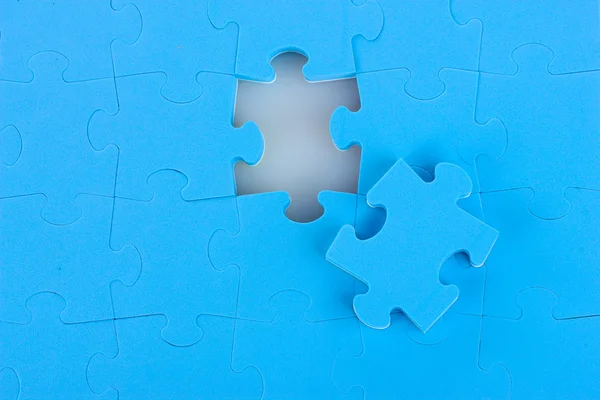 Blue puzzles closeup — Stock Photo, Image