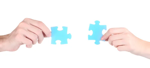 Mani e puzzle, isolati su bianco — Foto Stock