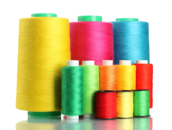 stock image Many-coloured bobbins of thread isolated on white