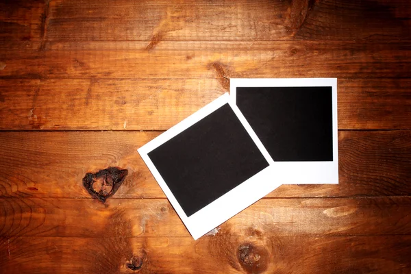 Carta fotografica su sfondo di legno — Foto Stock