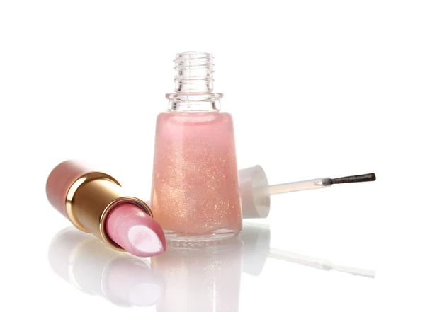 Pink lipstick and beige nail polish with sparkles isolated on white — Stock Photo, Image