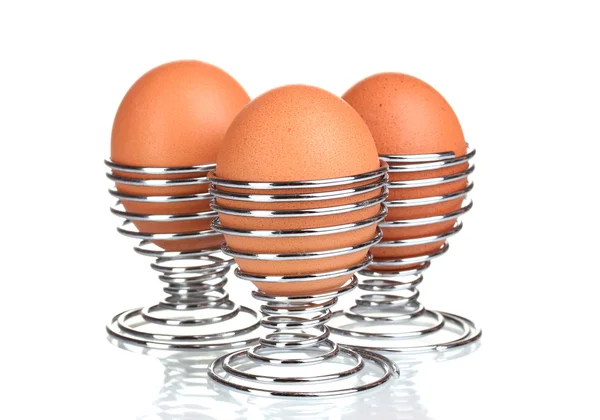 在金属站立在白色孤立的煮的鸡蛋 — 图库照片