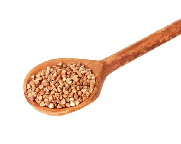 Cucchiaio di legno con grano saraceno grezzo isolato su bianco — Foto Stock