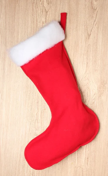 Christmas sock on wooden background — Stock Photo, Image