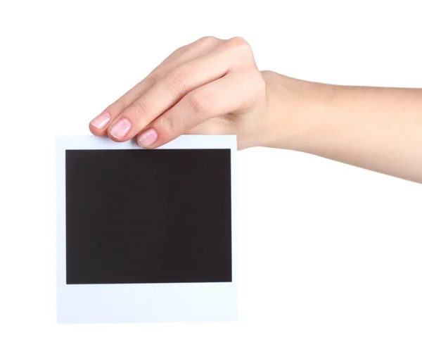 Ένα φωτογραφικό χαρτί στο χέρι που απομονώνονται σε λευκό — Φωτογραφία Αρχείου