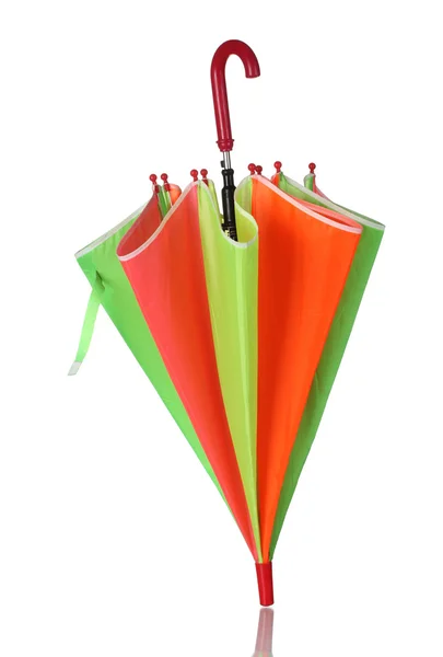Guarda-chuva multicolorido fechado isolado em branco — Fotografia de Stock