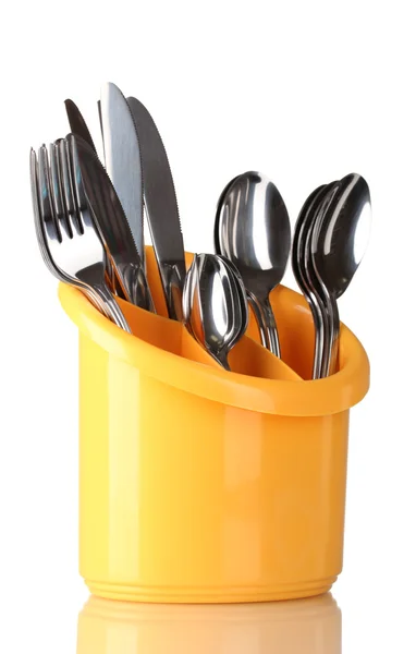 Keuken bestek, messen, vorken en lepels in gele stand geïsoleerd op wit — Stockfoto