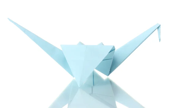 Origami crane ur det blå papper isolerad på vit — Stockfoto