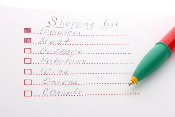 Lista de compras y pluma de primer plano — Foto de Stock