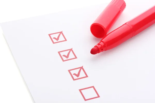 Checklist and red marker closeup — Stock Photo, Image