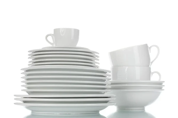 Cuencos vacíos, platos y tazas aislados en blanco — Foto de Stock