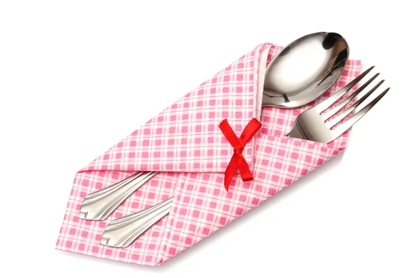 Fork and spoon in a plaid cloth with a bow isolated on white — Stock Photo, Image