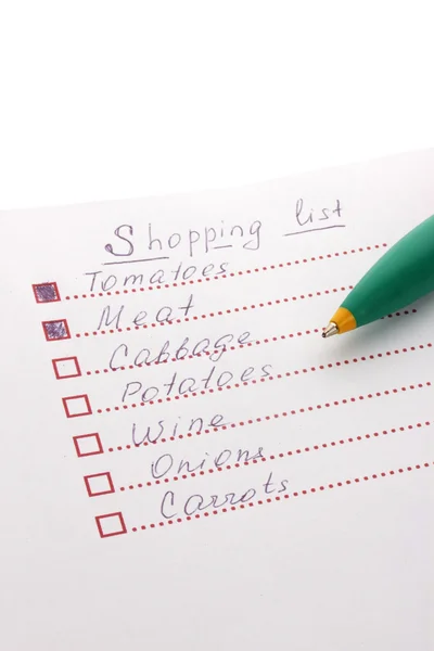 Shoping lijst en pen close-up — Stockfoto