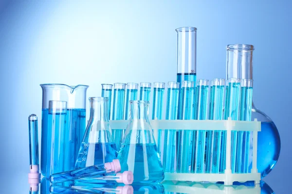 stock image Test-tubes on blue background