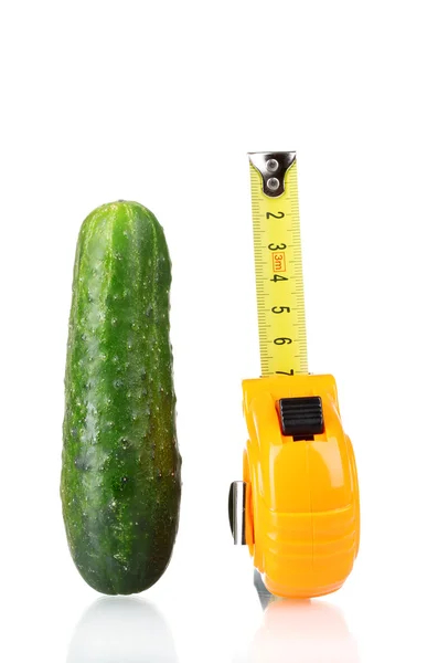 Cucumber with measuring tape isolated on white — Stock Photo, Image