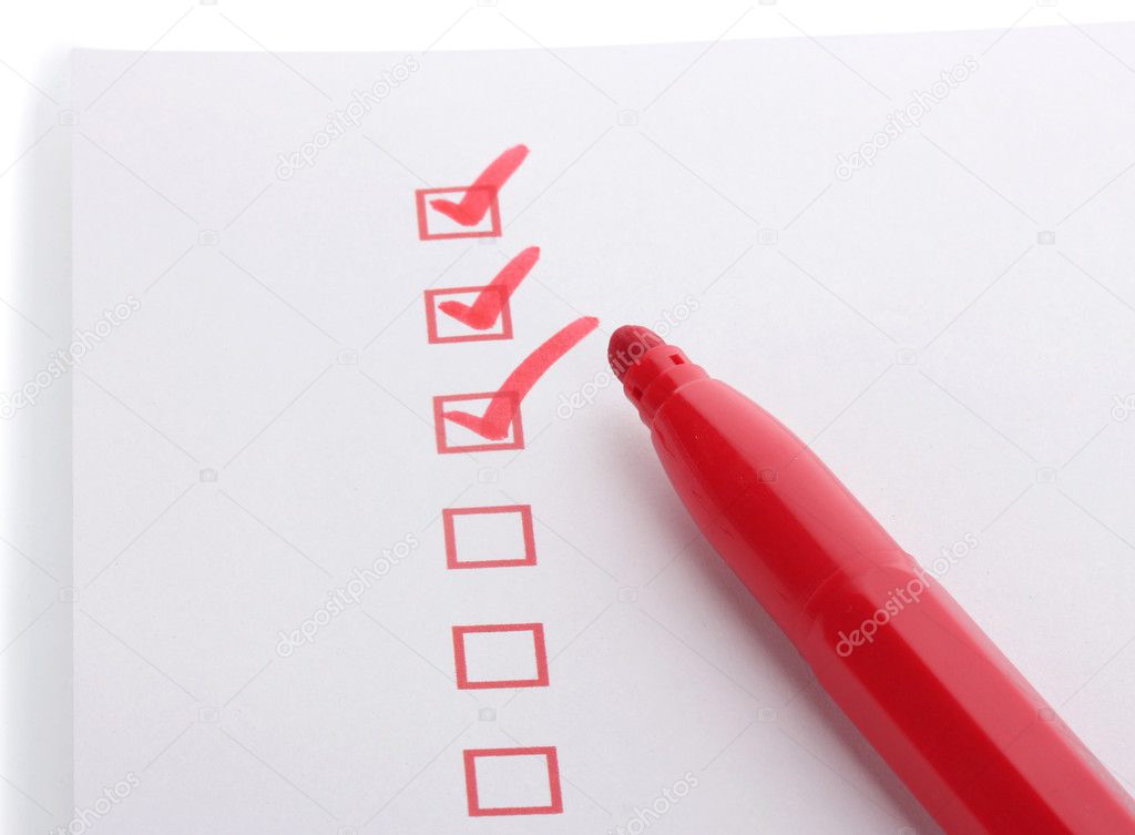 Checklist and red marker isolated on white