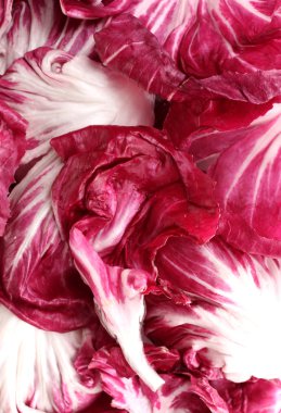 Red cabbage leaves closeup clipart