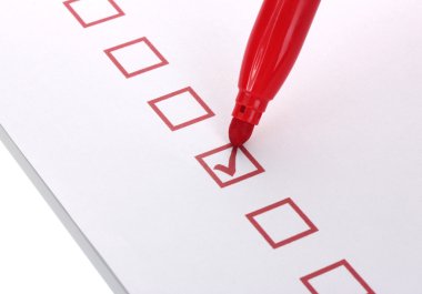 Checklist and red marker closeup clipart