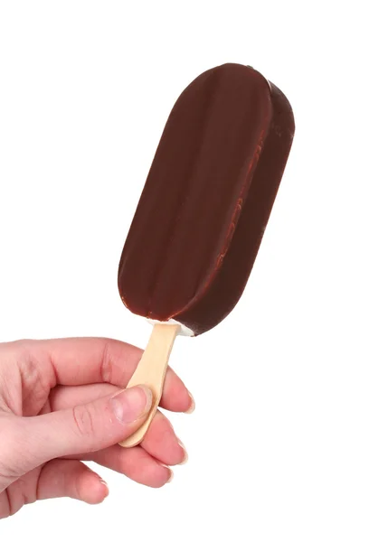 Un helado de vainilla de chocolate en mano aislado en blanco — Foto de Stock