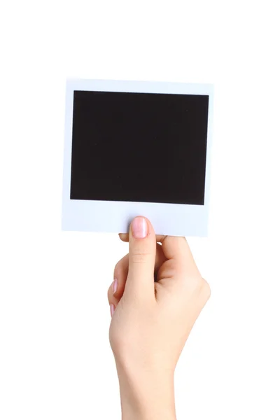 Bir fotoğraf kağıdı üzerine beyaz izole el — Stok fotoğraf