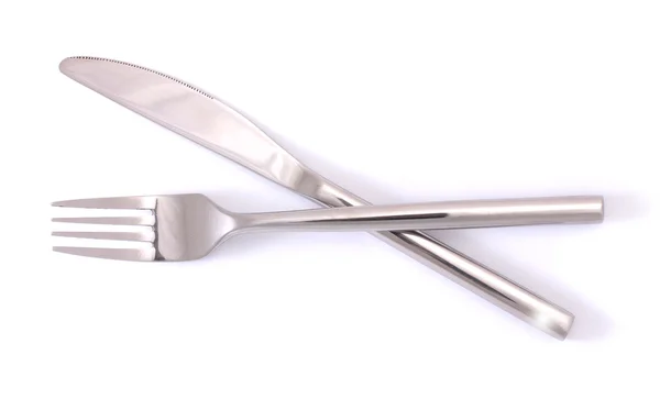 Серебряная вилка и нож изолированы на белом — стоковое фото