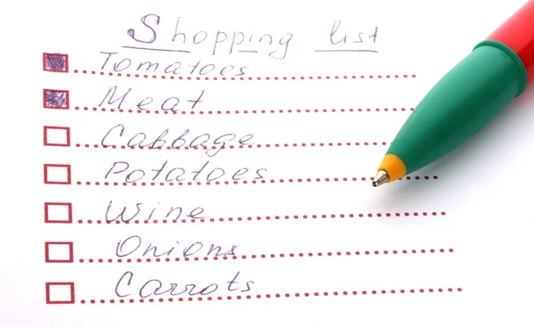 Shopping-Liste und Kugelschreiber Nahaufnahme — Stockfoto