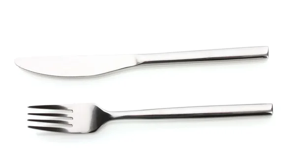 Srebrny widelec i nóż na białym tle — Zdjęcie stockowe