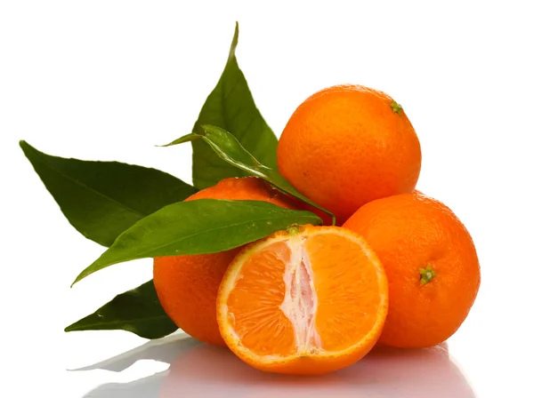 stock image Ripe tasty tangerines with leaves and segments isolated on white