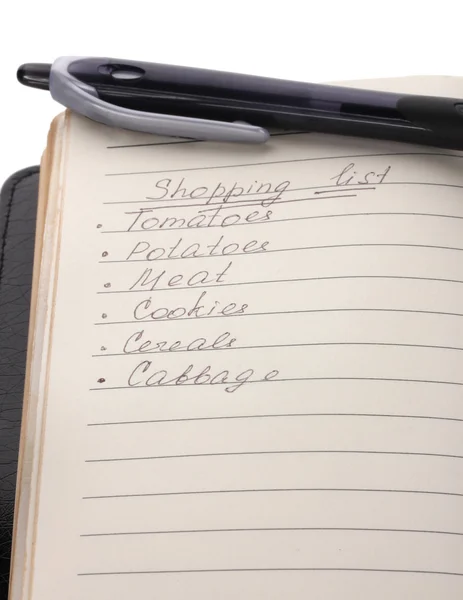 ショッピング リストとペンを白で隔離されます。 — ストック写真