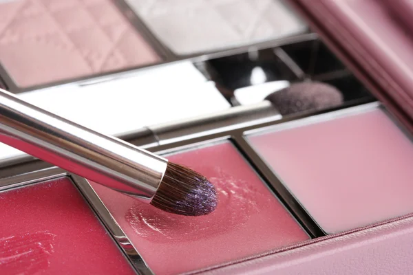 Makeup set with brush closeup Stock Photo