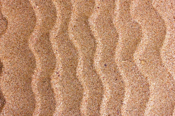 Onde sullo sfondo di sabbia — Foto Stock