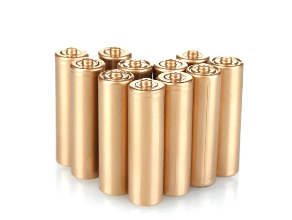 Zlatá baterie izolovaných na bílém — Stock fotografie
