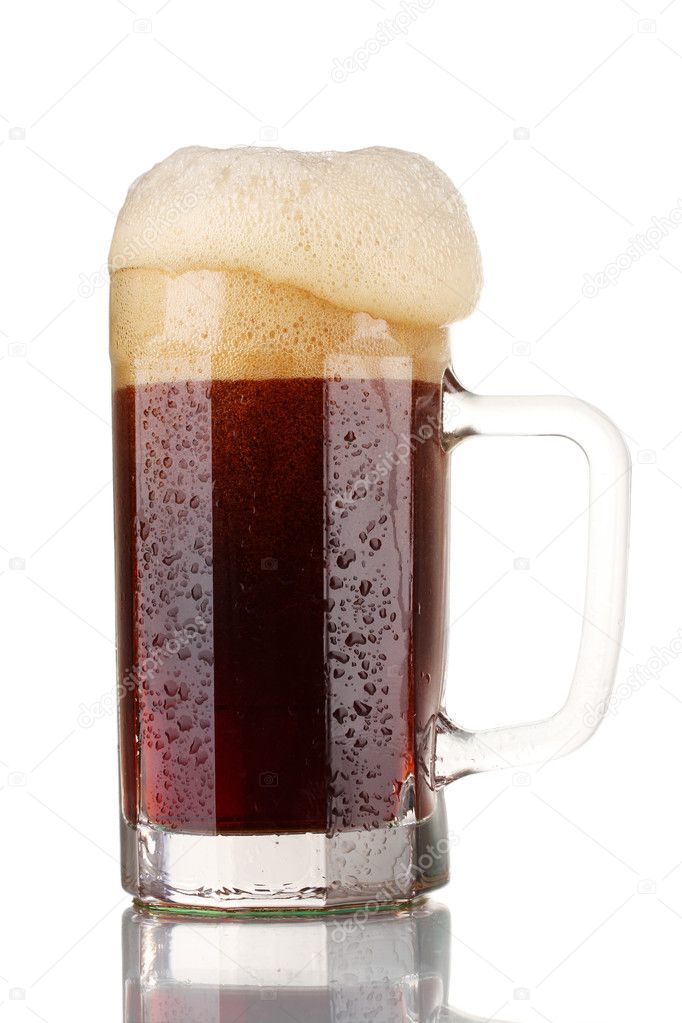 Red beer with the foam in mug isolated on white