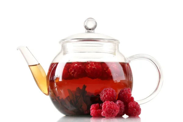 Glass black fruit tea in glass teapot isolated on white — Stock Photo, Image
