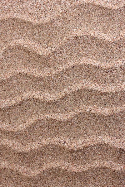 波浪对砂背景 — 图库照片