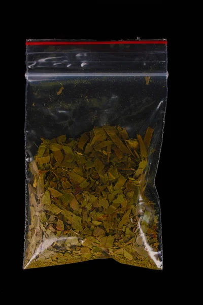 Marihuana in confezione su sfondo nero — Foto Stock