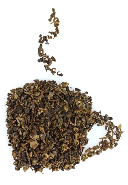 Forma de taza de té seco verde aislado en blanco —  Fotos de Stock