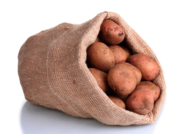 Pommes de terre fraîches dans le sac isolé sur blanc — Photo