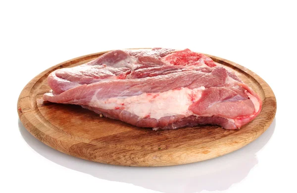 Raw meat on a wooden board isolated on white — Stock Photo, Image