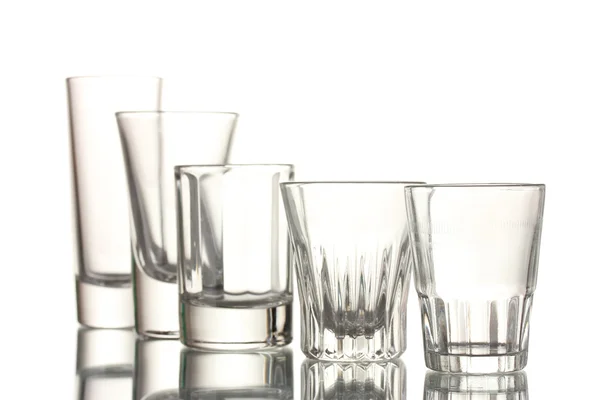 Birçok bir boş bardağı beyaz izole — Stok fotoğraf