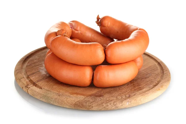 Tasty sausages on wooden board isolation on white — Stock Photo, Image
