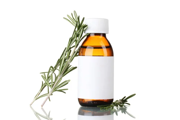 Medical bottle and fresh green rosemary isolated on white — Stock Photo, Image
