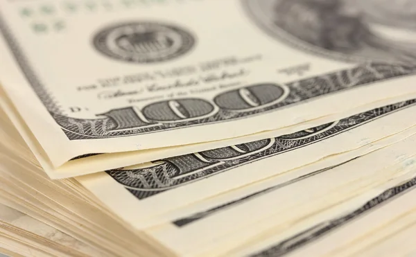 A lot of one hundred dollar bills closeup — Stock Photo, Image