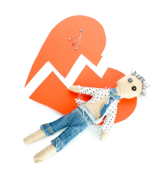 Voodoo doll boy on the broken heart isolated on white — Stock Photo, Image