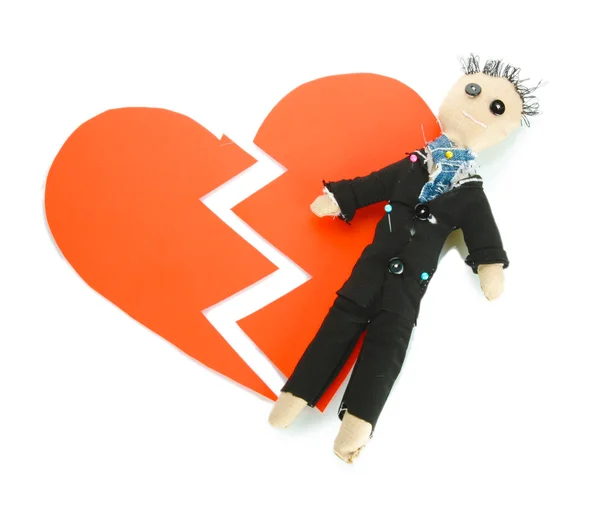 stock image Voodoo doll boy-groom on the broken heart isolated on white