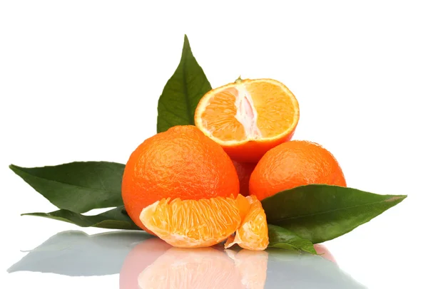Ripe tasty tangerines with leaves and segments isolated on white Royalty Free Stock Images