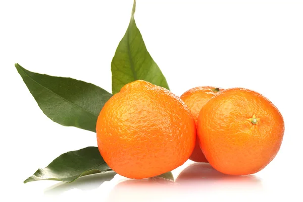 Ripe tasty tangerines with leaves isolated on white — Stock Photo, Image